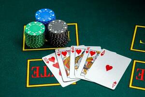 Poker play. Chips and cards photo