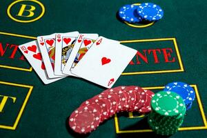 Poker play. Chips and cards photo