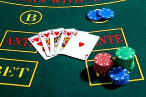 Poker play. Chips and cards photo