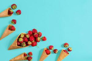 Fresh strawberry in waffle cones. Creative food concept. Flat la photo