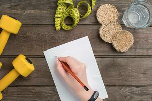 Concept diet, slimming plan with vegetables top view mock up photo