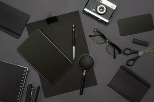 Workplace with office items and business elements on a desk. Concept for branding. Top view. photo