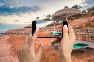 móvil teléfono fotografía de un playa amplio ver horizontal foto