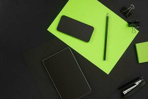 Mix of office supplies on a modern desk photo