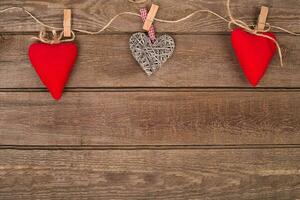 hearts on wooden background. Valentines day photo