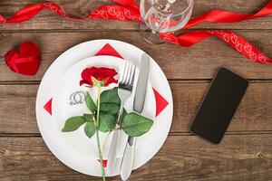 Romantic dinner concept. Valentine day or proposal background. photo