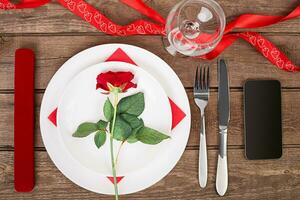 Romantic dinner concept. Valentine day or proposal background. photo