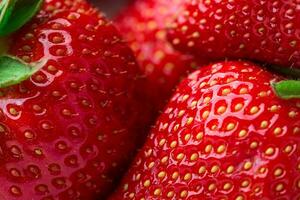 Fresh strawberry background. Ripe in close-up. photo