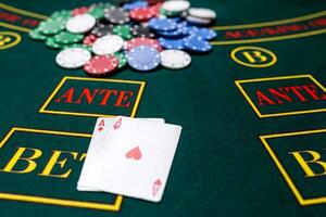 Poker chips on a table at the casino photo