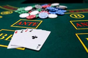 Poker chips on a table at the casino photo