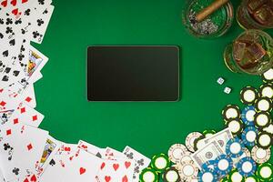 View from above with copy space. Banner template layout mockup for online casino. Green table, top view on workplace. photo