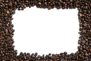 White background with coffee beans on four side photo