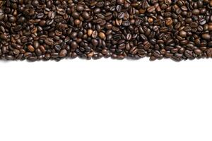 White background with coffee beans on the side photo