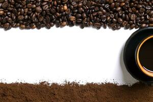 White background with cup of coffee, coffee beans and ground coffee on below and above. photo