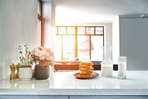 Toast wheat bread sliced and cow milk on table, breakfast in morning photo