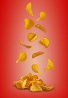 Potato crisps falling down against a red background with copy space for text or images. Crispy, palatable chips. Advertising. Close-up. photo