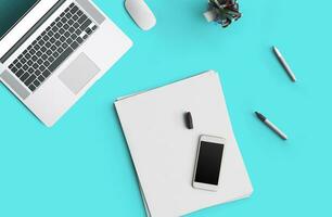 Concept of business still life with office objects on blue surface photo