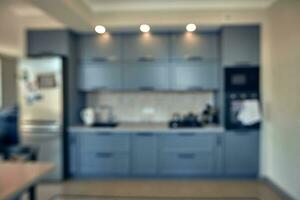 blurred image of modern kitchen interior for background photo