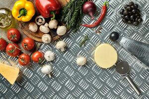 Ingredients for cooking pizza on metal table, top view photo