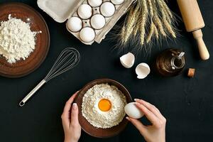 Women's hands are preparing home-made raw noodles, Rustic, Selective Focus, Atmospheric dark tone photo