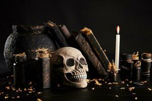 Realistic model of a human skull with teeth on a wooden dark table, black background. Medical science or Halloween horror concept. Close-up shot. photo