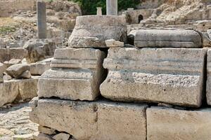 Ruins of Sanctuary of Apollo Hylates located at the beach of mediterranean sea. Near an ancient greek town of Kourion. Limassol, Episkopi, Cyprus. photo