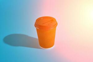 Hot coffee in brown paper cup with black lid on blue background photo