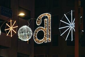 Christmas decorations on the streets of Alicante, Spain at night photo