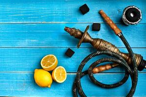 Tobacco background. Turkish smoking hookah with tobacco flavor of ripe lemon photo