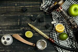 Arábica narguile con un tabaco sabor de un mezcla de cítricos y manzana foto