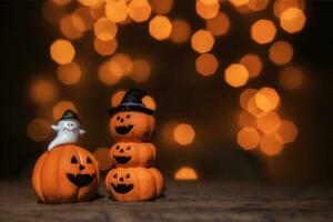 Festive Halloween Pumpkin Decoration with Glowing Anthropomorphic Face photo