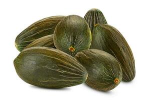 Pile of a ripe green tendral melons isolated on white background with copy space for text or images. Side view. Close-up shot. photo