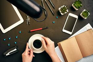 Architect working on blueprint. Architects workplace - architectural project, blueprints, tablet pc. Engineering tools. Top view photo