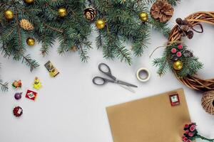 Merry Christmas card and envelope. Christmas decoration background. Flat lay, top view. photo