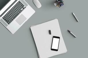 Concept of business still life with office objects on gray surface photo