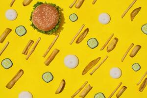 Design concept of mockup burger and french fries set on yellow background. photo