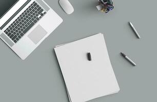 Concept of business still life with office objects on gray surface photo