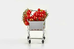 Mini shopping cart full with cherry tomatos on white background photo