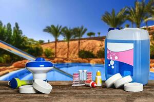 Equipment with chemical cleaning products and tools for the maintenance of the swimming pool. photo