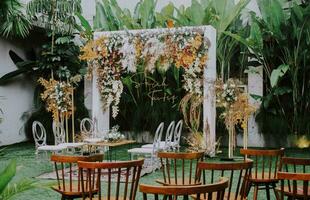 wedding stage on outdoor with elegant flowers decoration photo