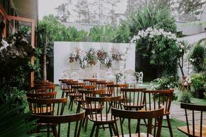 wedding stage on outdoor with elegant flowers decoration photo