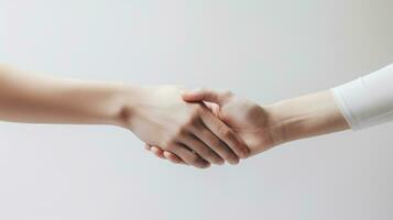 Handshake of two business people over grey background. Teamwork concept Generative AI photo