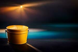 a yellow bucket sitting on a table in front of a pool. AI-Generated photo