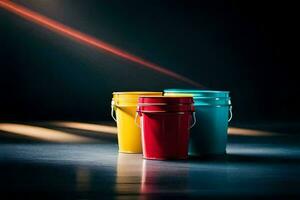 three colorful buckets on a dark floor. AI-Generated photo