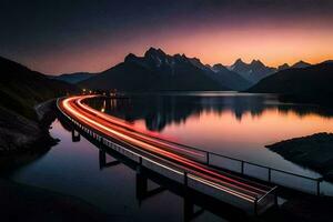 a bridge over a lake at sunset with mountains in the background. AI-Generated photo