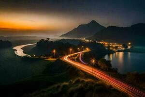 a long exposure photograph of a road and a lake at sunset. AI-Generated photo