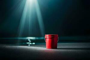 a red bucket on the beach with light shining from the sky. AI-Generated photo