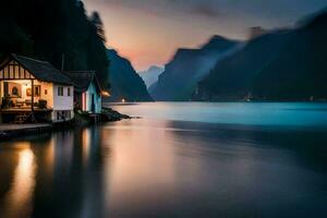 un casa se sienta en el apuntalar de un lago a oscuridad. generado por ai foto