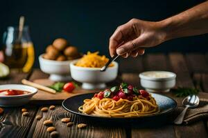 a hand is holding a spoon over a plate of spaghetti. AI-Generated photo