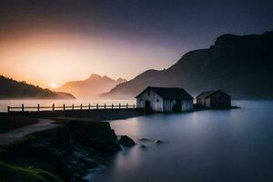 un casa se sienta en el apuntalar de un lago a amanecer. generado por ai foto